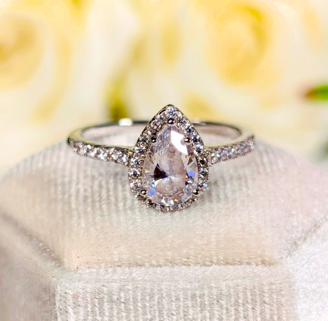 Heavenly Hidden Pear Halo Ring